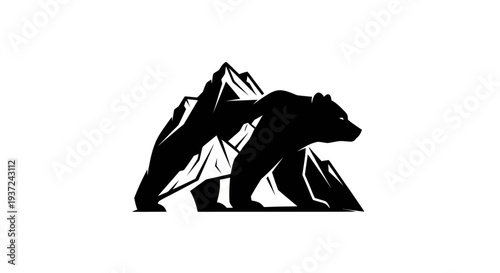 Bear silhouette in mountainous landscape