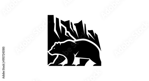 Bear silhouette in rocky landscape