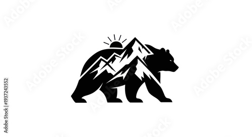 Bear silhouette with mountain and sun