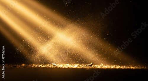Golden light beams shining on sparkling particles in dark room