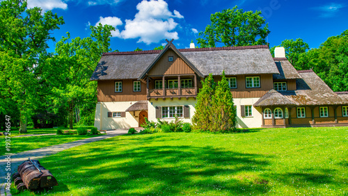 Wallpaper Mural Beautiful buildings of Latvia among the trees Torontodigital.ca