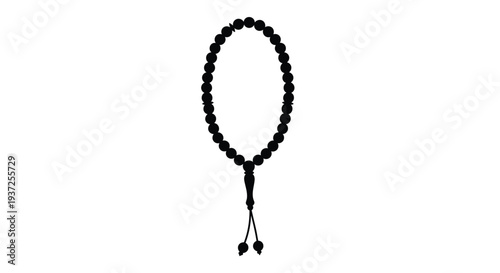 Black prayer beads displayed on a white background stark silhouette