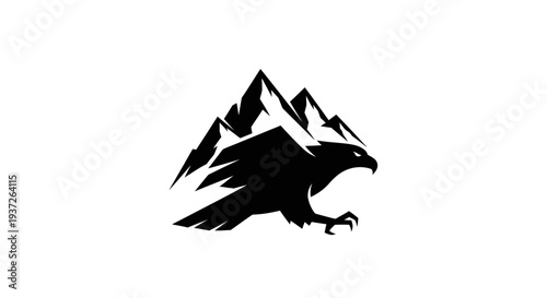 Eagle soaring over mountain peaks