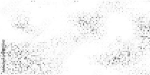 Halftone abstract background. The monochrome texture of dots of ink. Grunge pattern for printing and creating design