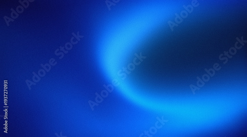 Fotografie Abstract deep blue mesh gradient background with vibrant spotlight and grain