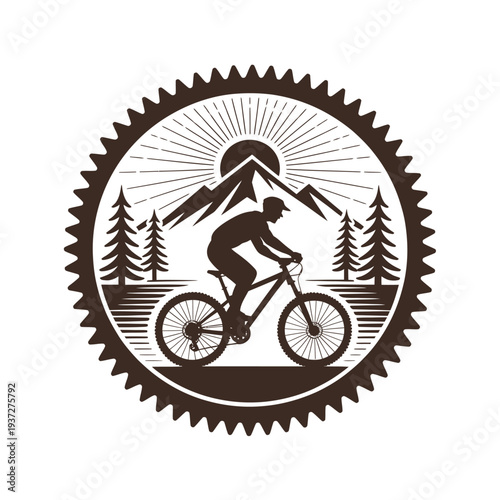 Silhouette of a mountain biker riding towards a sunset within a circular badge