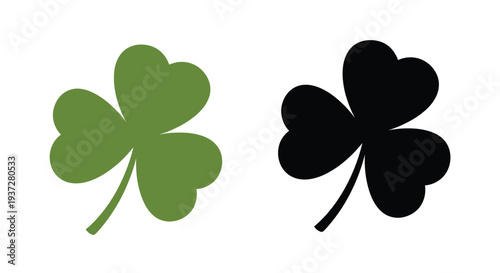 Two clover leaves one colored and one a dark silhouette