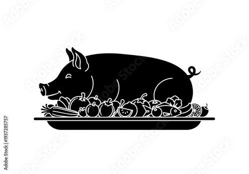 A perfect looking black silhouette of a perfect grilled pig lying on a platter with lots of vegetables