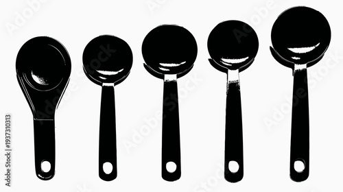Black cooking utensils with a handle and round bowl are displayed, isolated on a white backdrop