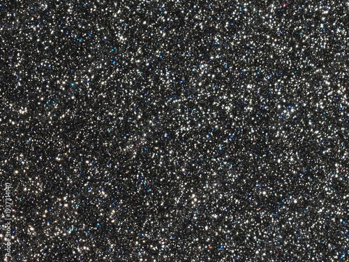 Foto Extreme macro close-up of dark metallic texture with crushed silver diamond glit