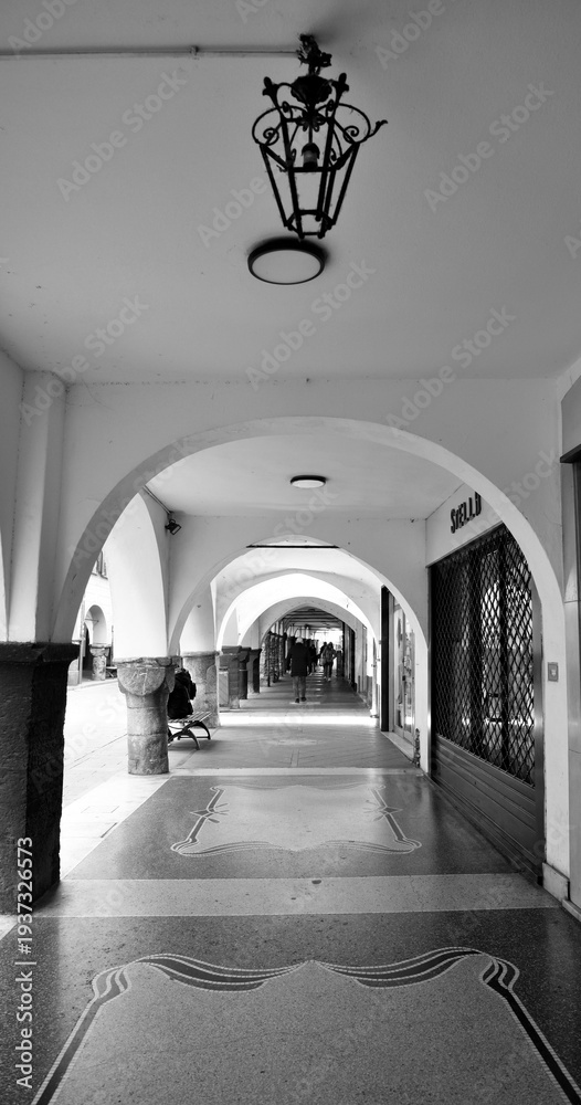 Fototapeta premium A glimpse of the historic arcades in the center of Chiavari, in the province of Genoa 