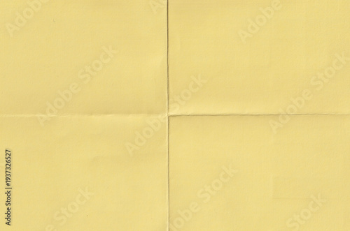 фотографія Yellow folded paper texture background with diagonal creases and crumpled aesthetic, vintage cyan paper sheet with weathered surface and organic grain for creative graphic design and scrapbooking