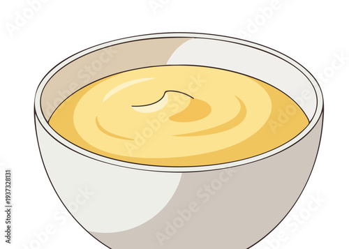 a bowl of creamy yellow soup.
