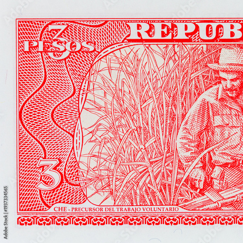 3 Pesos of Cuba with a portrait of a farmer cutting sugar cane. Vintage Cuban money.