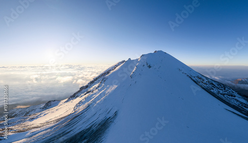 Panoramic view of the snow covered summit of Pico de Orizaba, also known as Citlaltepetl, the highest volcano in Mexico. 