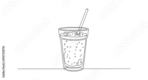 Refreshing glass of soda with straw