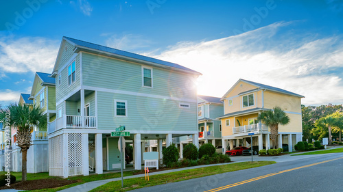 Obraz na płótnie Colorful beach houses with palm trees on the Atlantic coast in Myrtle Beach, Sou