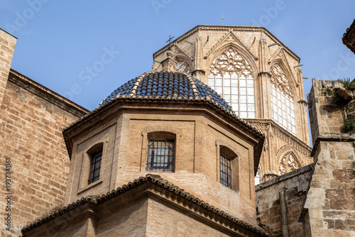 Valencia Cathedral and Royal Basilica of Our Lady of the Forsaken (Real Basílica de Nuestra Señora de los Desamparados) from Plaza de la Virgen, Valencia, Spain. 