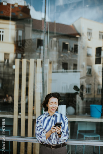 Korean woman using smartpho...