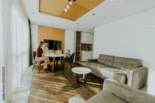 Family enjoys breakfast tog...