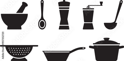 Black kitchen utensils and cookware on white background mortar
