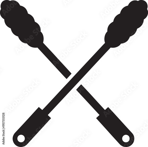 Crossed black barbecue tongs with holes kitchen