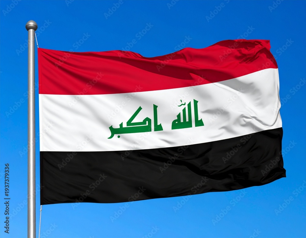 Naklejka premium national flag of Iraq waving on a flagpole against a clear blue sky background.