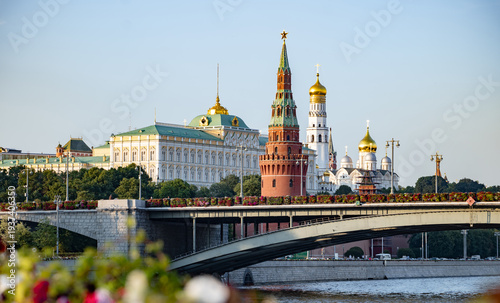 Fotografie Kremlin architecture and Moskva River bridge, Moscow, Russia, golden summer afte
