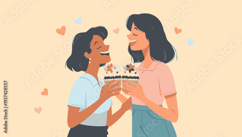 Two women sharing a birthday cake with colorful hearts.