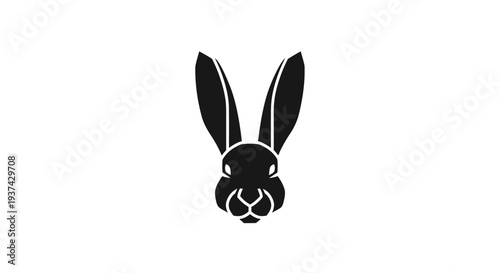Black silhouette of a rabbit face.