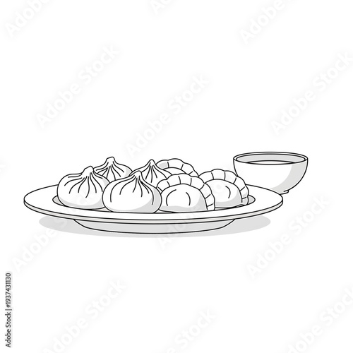 Plate of Dumplings with Dipping Bowl.