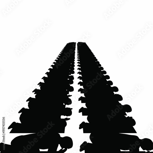 Silhouette of People Kneeling in Rows.