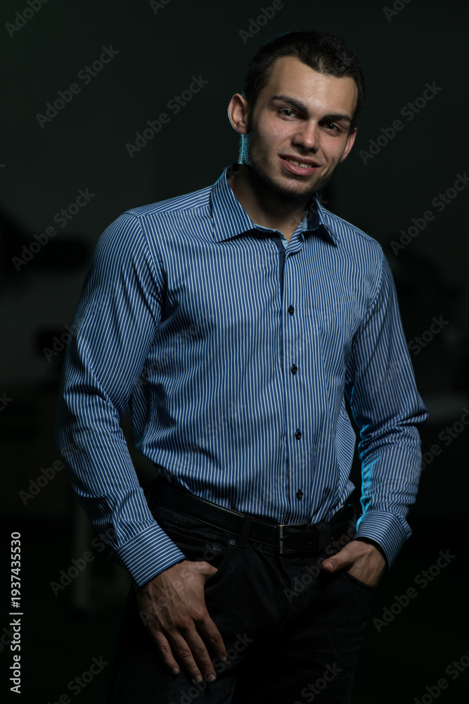 Obraz premium Portrait Of A Man In Business Clothing