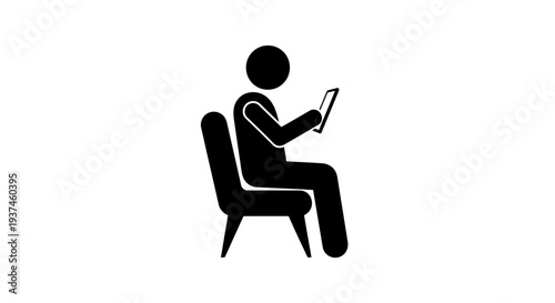 Person sitting on chair reading.