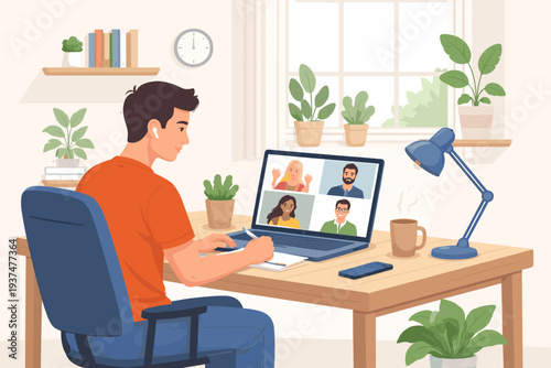 Young man working from home participating in a video conference meeting with colleagues on a laptop screen, taking notes at a desk with plants, lamp, and coffee in a bright home office setting.