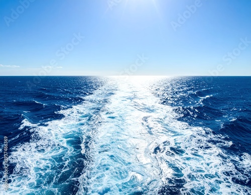 Wallpaper Mural Vibrant blue ocean with foamy wake under a bright sunny sky. Torontodigital.ca