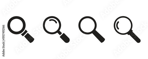 Set of four magnifying glass icons in different styles and perspectives for search and discovery