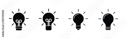 Set of four black light bulb icons on white background idea concept