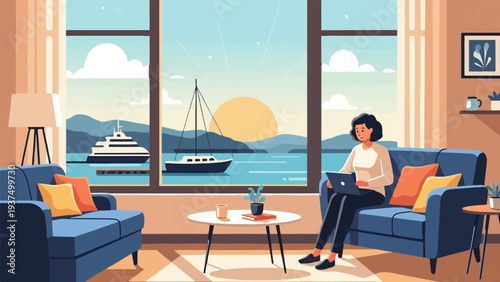 Woman works on laptop on a couch with a beautiful ocean view at sunset