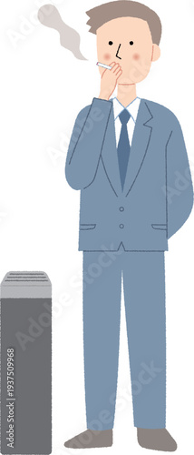 喫煙所でタバコを吸う若い男性会社員