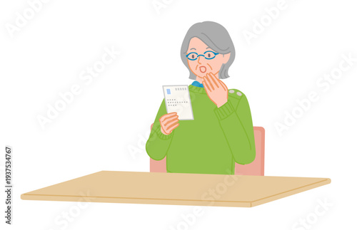 Senior woman looking at postcard with surprised expression