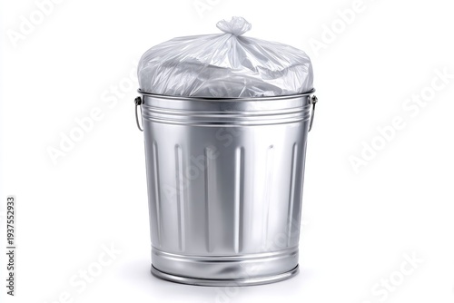 A metallic waste receptacle with a clear plastic bag full of refuse inside set against a plain white background