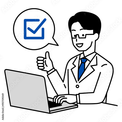 ノートパソコンを操作しながら完了の合図をする医師の男性