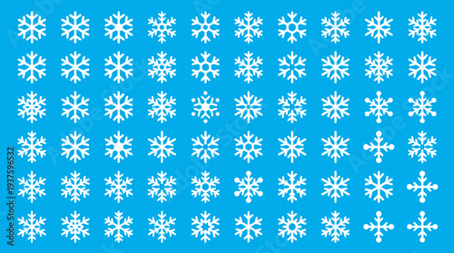 Collection of white snowflakes on a blue background.
