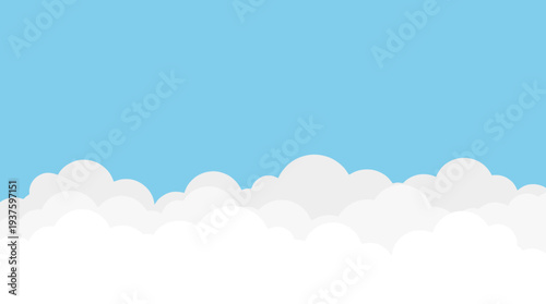 Serene blue sky with white fluffy clouds.