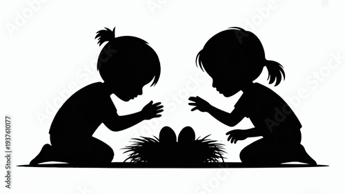 Two young girls crouching together playing with eggs in a nest surrounded by grass depicted in a simple black silhouette against a white background