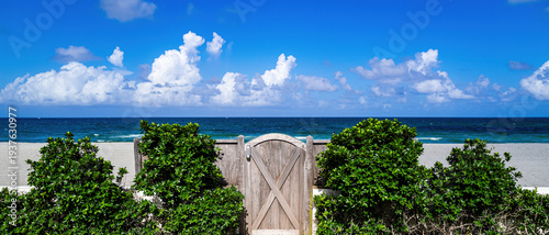 Panel kuchenny z motywem Beach tropical paradise with ocean horizon view. Beach luxury vacation with green lawn serenity. Beach summer travel with blue sky calm. Beach coastal escape with peaceful atmosphere.
