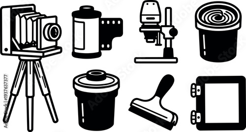 Line art flat design bellows camera on tripod with film canister enlarger developer tray squeegee and negative holder close up