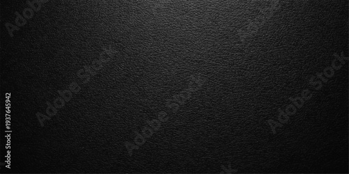 Dark black leather texture background with a macro pattern of rough vintage material skin for a dark grey fabric surface wallpaper and fashion textile backdrop