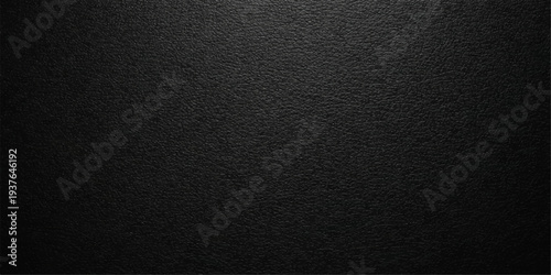 A dark macro closeup of a textured black leather surface shows a rough grunge pattern and gray structural details on the old textile material backdrop